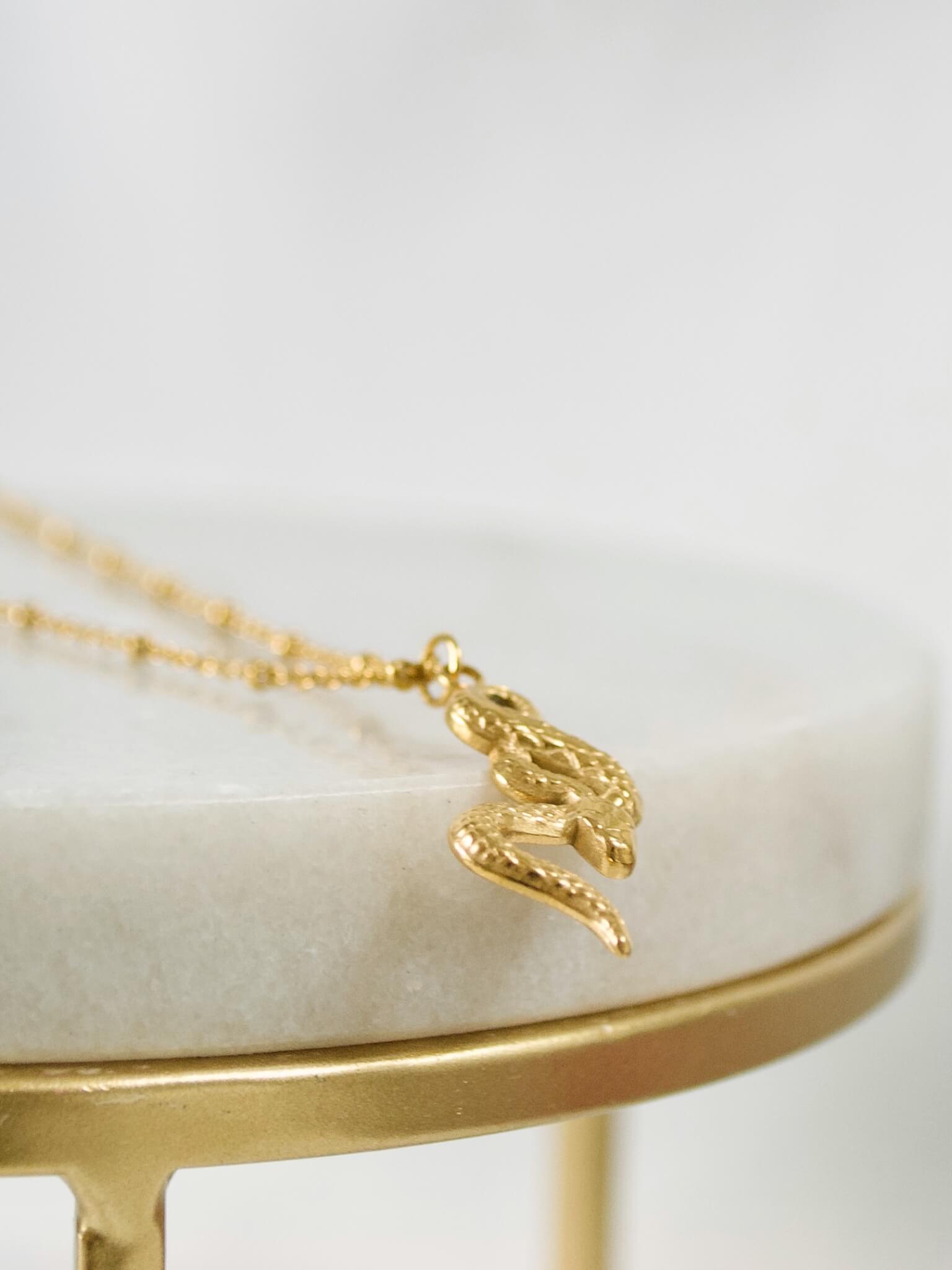 THE SERPENT PENDANT NECKLACE, GOLD